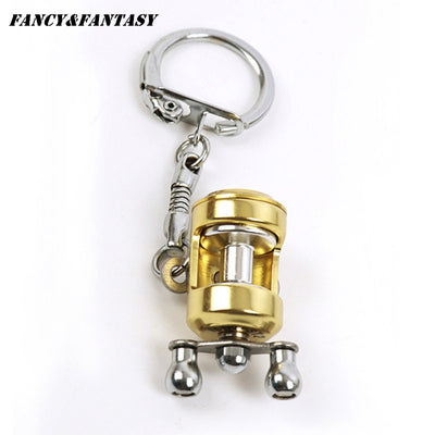 Fancy&Fantasy  Fish Wheel keychain Gold Color Fly Fisherman Spinning Fishing Reel Charactor Miniature Key chain With Key Ring